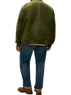 Blouson kaki uni avec une coupe ajustée et 2 poches raglan à l'avant