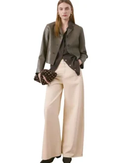 Blouson kaki uni en simili-cuir avec une coupe droite et un col à revers