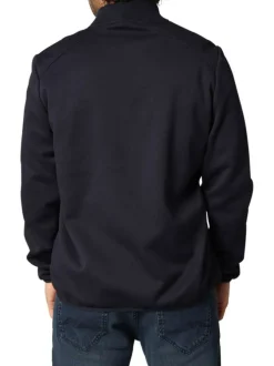 Blouson marine avec un col montant zippé et logo de la marque sur une manche