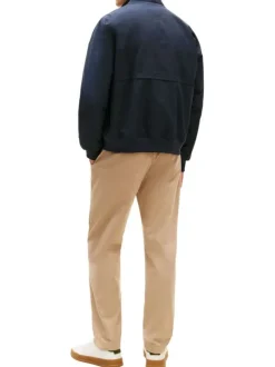 Blouson marine à coupe ajustée pourvu d'un col boutonné et de manches longues