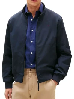 Blouson marine à coupe ajustée pourvu d'un col boutonné et de manches longues
