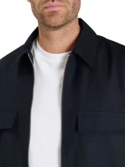 Blouson marine à coupe ajustée pourvu d'une fermeture zippée