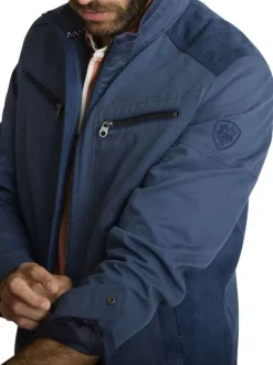 Blouson marine uni avec une coupe ajustée et une fermeture zippée