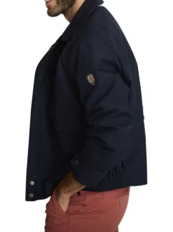 Blouson marine uni avec une coupe ajustée, un zip et des boutons-pressions
