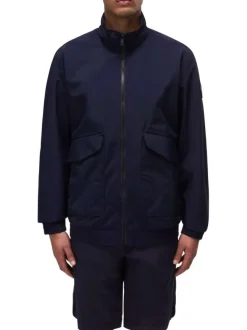 Blouson marine uni avec une coupe droite à col montant et des poches