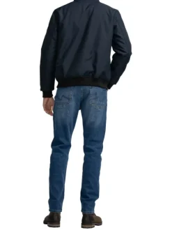 Blouson marine uni avec une coupe droite, col montant et fermeture zippée