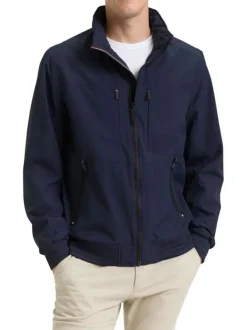 Blouson marine uni avec une coupe droite et des poches zippées à l’avant