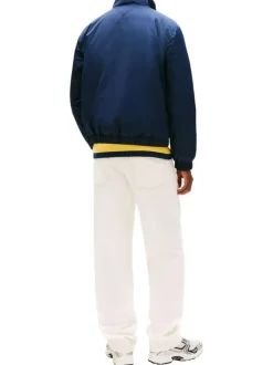Blouson marine uni avec une coupe droite et un col montant