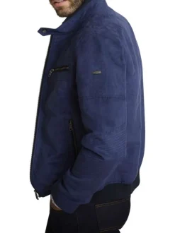 Blouson marine uni avec une coupe droite et un col montant avec un bouton
