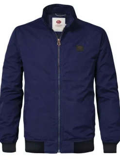 Blouson marine uni coupe droite avec un col montant et un patch à la poitrine