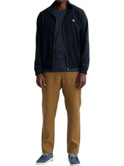 Blouson marine uni pourvu d'une coupe droite et d'un col montant
