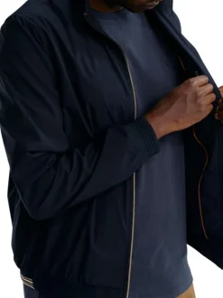Blouson marine uni pourvu d'une coupe droite et d'un col montant