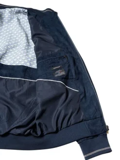 Blouson marine uni pourvu d'une coupe droite et d'un col montant