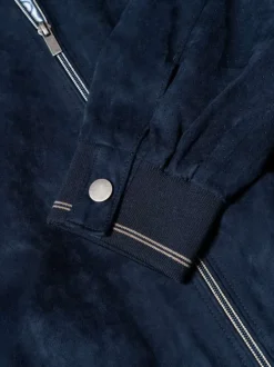 Blouson marine uni pourvu d'une coupe droite et d'un col montant