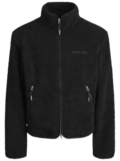 Blouson noir uni en sherpa avec une coupe droite et un col montant