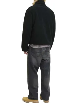 Blouson noir uni en sherpa avec une coupe droite et un col montant