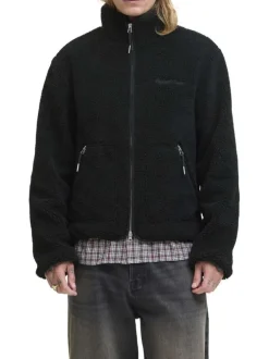 Blouson noir uni en sherpa avec une coupe droite et un col montant