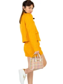 Blouson orange en tweed avec un col cranté et 4 poches à l'avant
