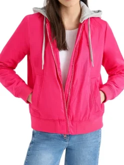 Blouson rose uni pourvu d'une coupe droite et d'une capuche détachable
