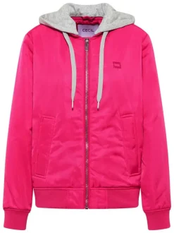 Blouson rose uni pourvu d'une coupe droite et d'une capuche détachable