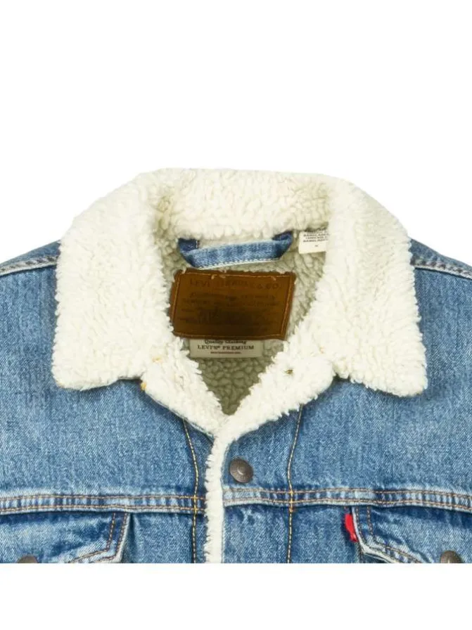 Blouson sherpa fourré en coton bleu jean avec une coupe droite