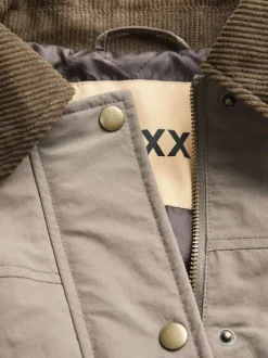 Blouson taupe uni à coupe légèrement oversize avec un col à revers côtelés