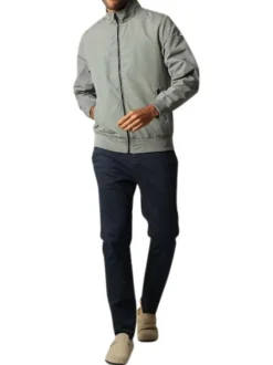 Blouson vert sauge uni à coupe droite et à col montant avec des poches zippées