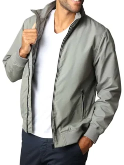 Blouson vert sauge uni à coupe droite et à col montant avec des poches zippées