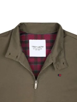 Blouson vert uni avec une coupe droite et un col montant boutonné