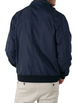 Blouson zippé marine uni avec une coupe droite et un col montant