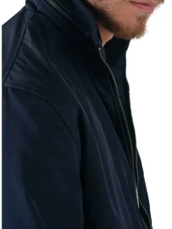Blouson zippé marine uni avec une coupe droite et un col montant