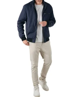 Blouson zippé marine uni avec une coupe droite et un col montant
