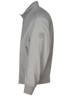 Bomber beige uni avec une coupe droite fluide et un col montant