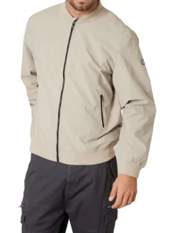 Bomber beige uni pourvu d'une coupe droite et d'un col montant