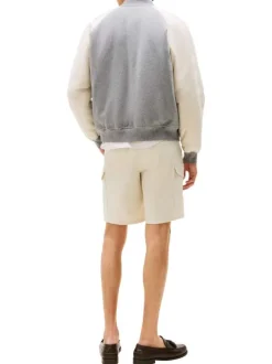 Bomber en coton gris avec un col châle et boutonnière chromée