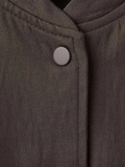 Bomber marron uni avec une coupe droite et un col rond en bord-côte