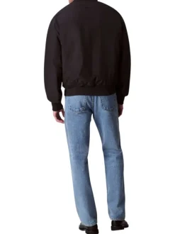 Bomber noir uni zippé à l'avant avec une coupe droite et des poches zippées