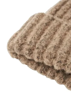 Bonnet beige moucheté en maille tricotée doux avec un revers