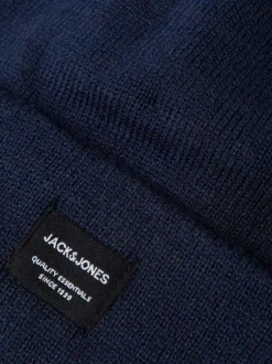 Bonnet bleu uni en maille avec étiquette iconique sur l'ourlet