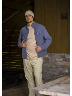 Bonnet beige uni avec revers en bord-côte et patch de la marque