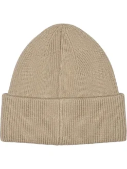 Bonnet beige uni avec un cœur brodé à l'avant et un revers sur le bas