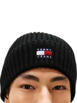 Bonnet en coton biologique noir uni avec un logo cousu à l’avant