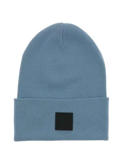 Bonnet en coton bleu uni avec un patch cousu sur le revers