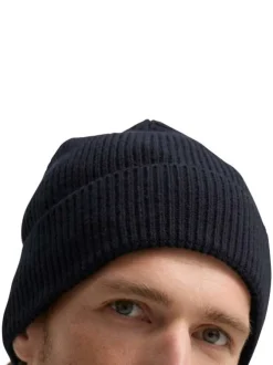 Bonnet marine uni en maille tricotée avec un logo en relief brodé