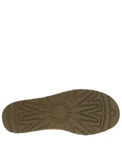 Boots en cuir camel à talon plat avec une doublure en fausse fourrure