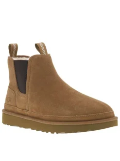 Boots en cuir camel à talon plat pourvues de soufflets élastiqués