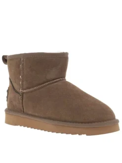 Boots en cuir de vachette beige, fourrées en laine, à semelle plate adhérente