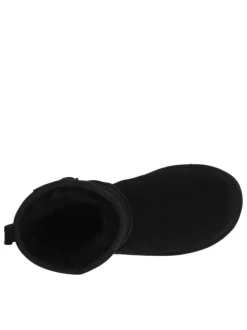 Boots en cuir de vachette noir, fourrées en laine, à semelle plate adhérente