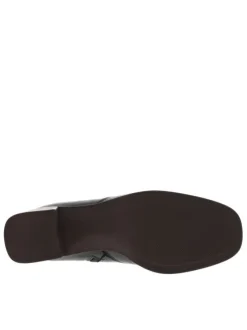 Boots en cuir noires à semelle à talon décroché haut avec une languette