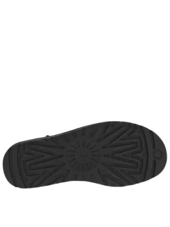 Boots en cuir noires à semelle à talon semi-compensée et fourrure
